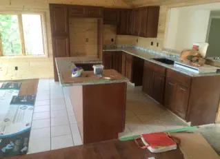 kitchen remodeling with dark cabinets and granite countertops