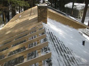 wood framing over existing roof